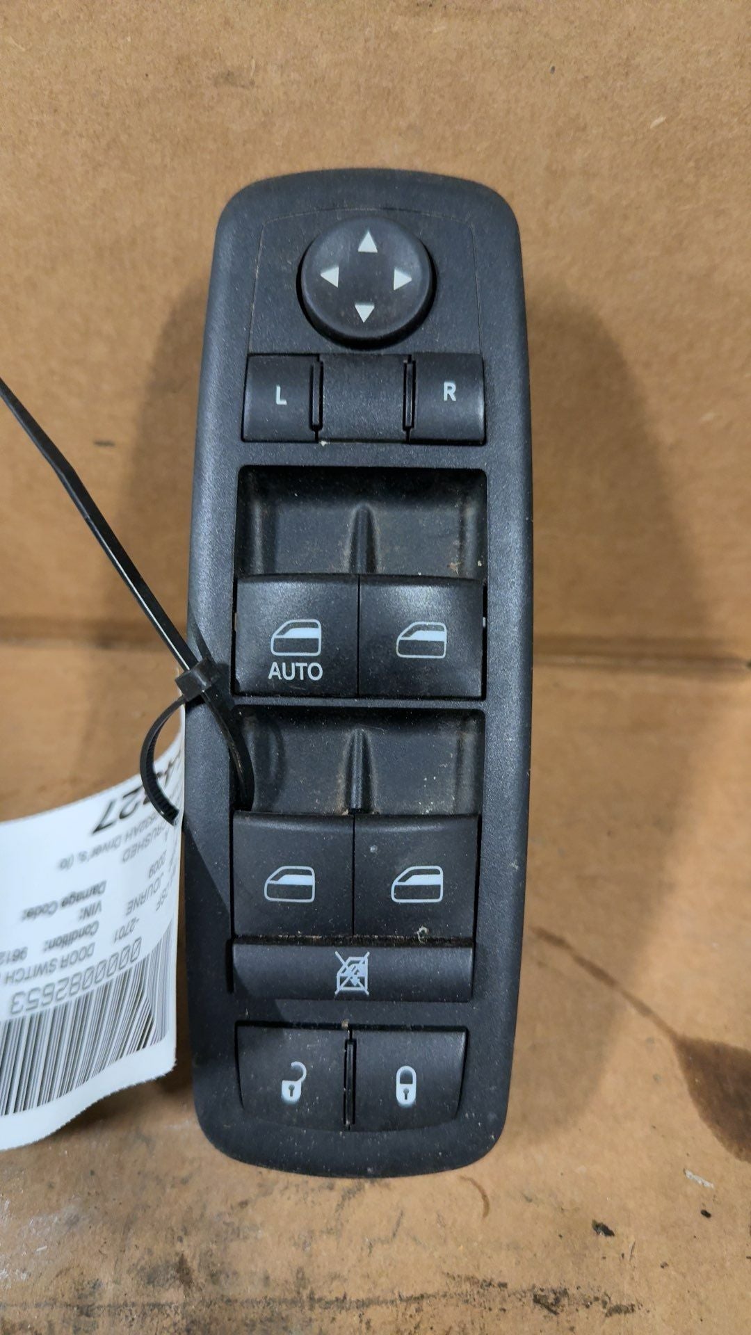 Window Master Switch from a 2009 Dodge Journey, left side, photo 1