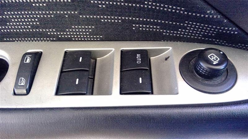 Window Master Switch from a 2012 Ford Fusion, left side, photo 1