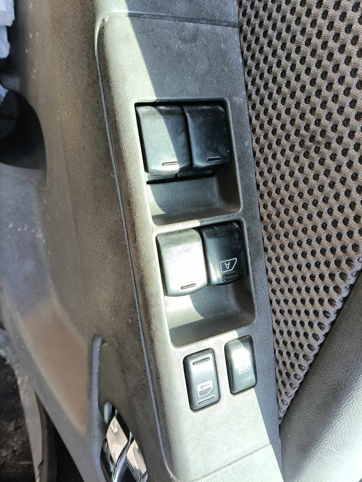 Window Master Switch from a 2006 Nissan, left side, photo 1