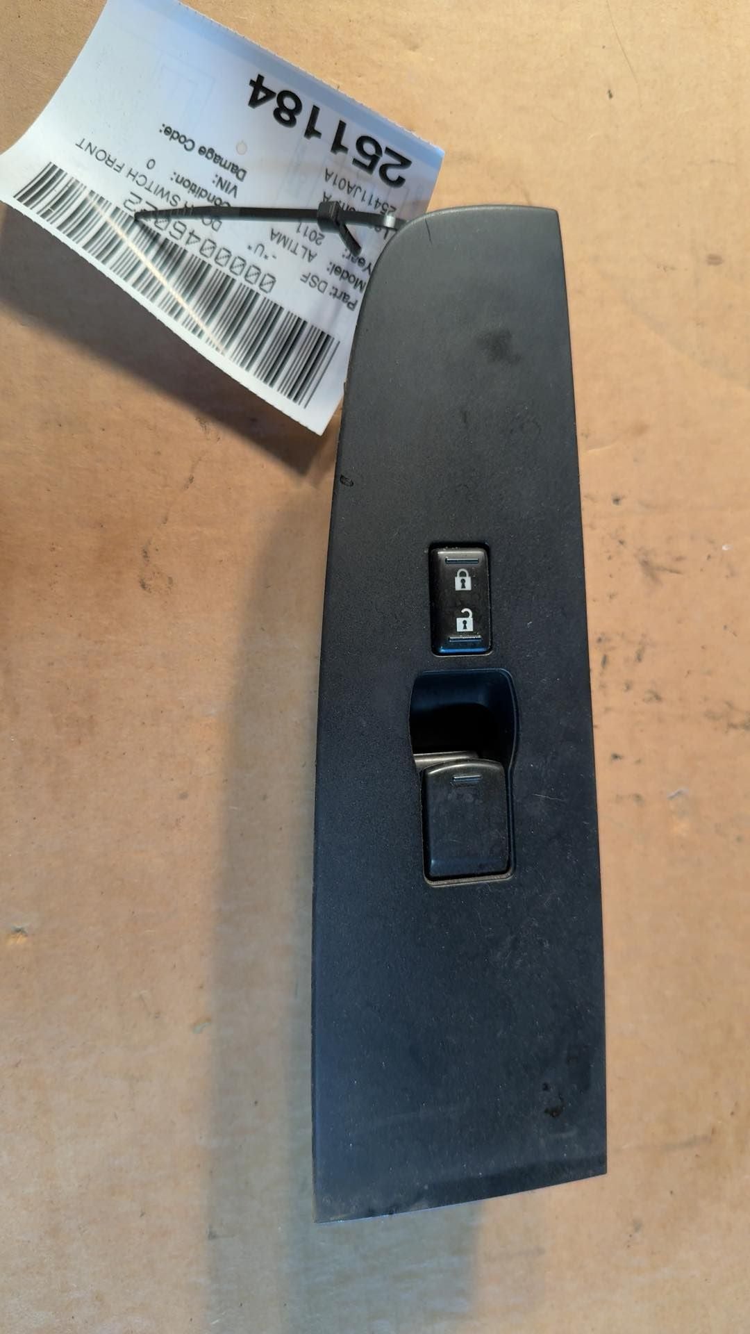 Window Switch from a 2011 Nissan Altima, right side, photo 1