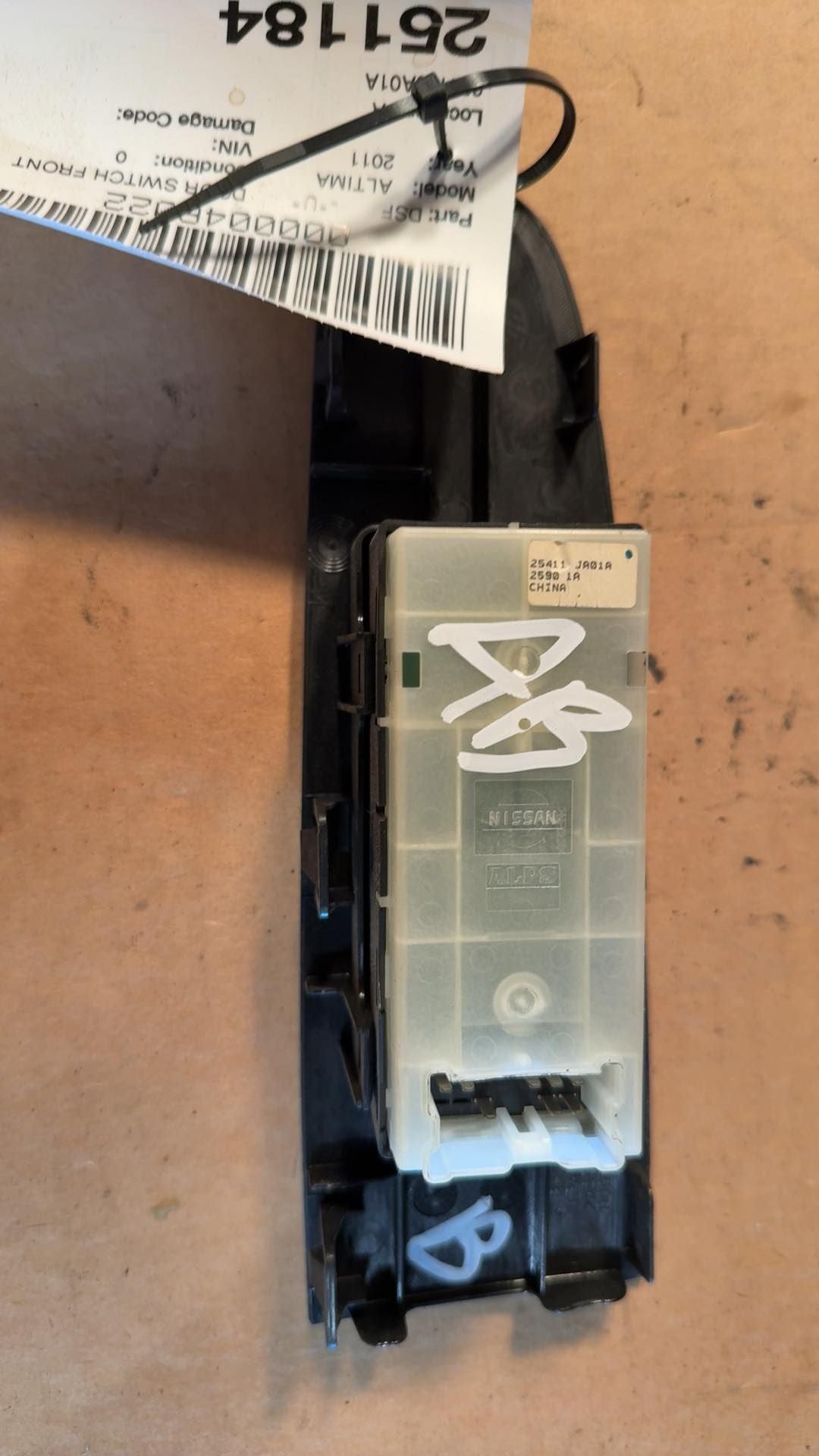 Window Switch from a 2011 Nissan Altima, right side, photo 2