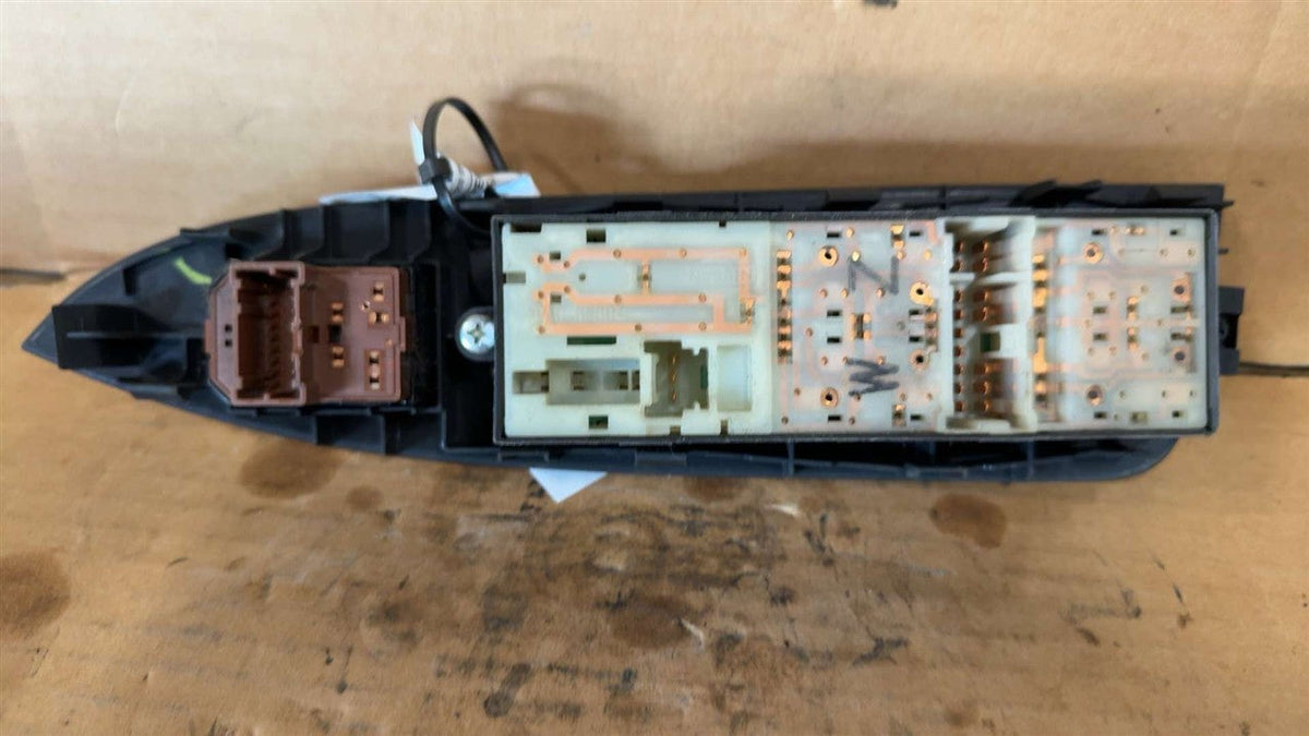 Window Master Switch from a 2009 Nissan Armada, left side, photo 3