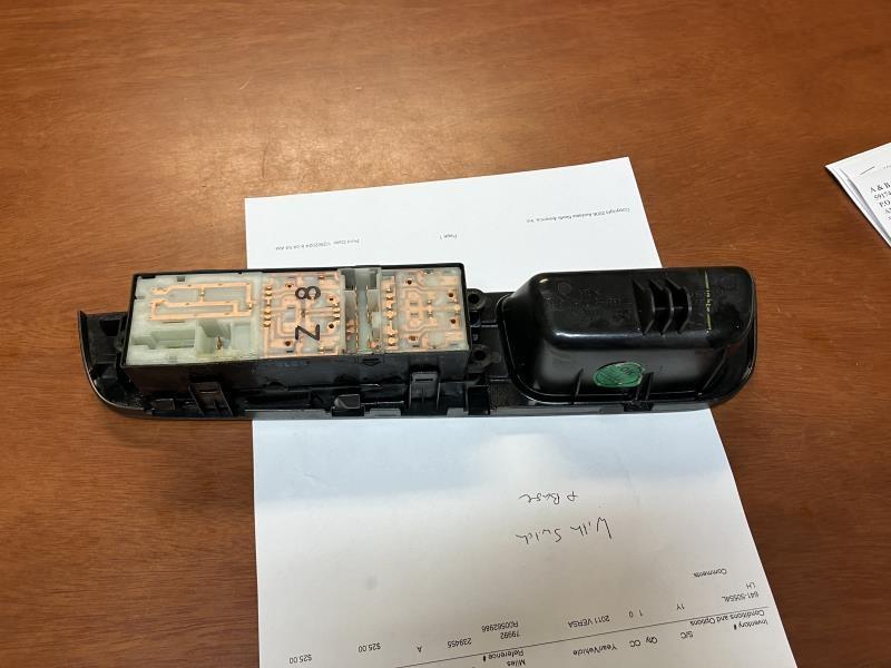 Window Master Switch from a 2011 Nissan Versa, left side, photo 3