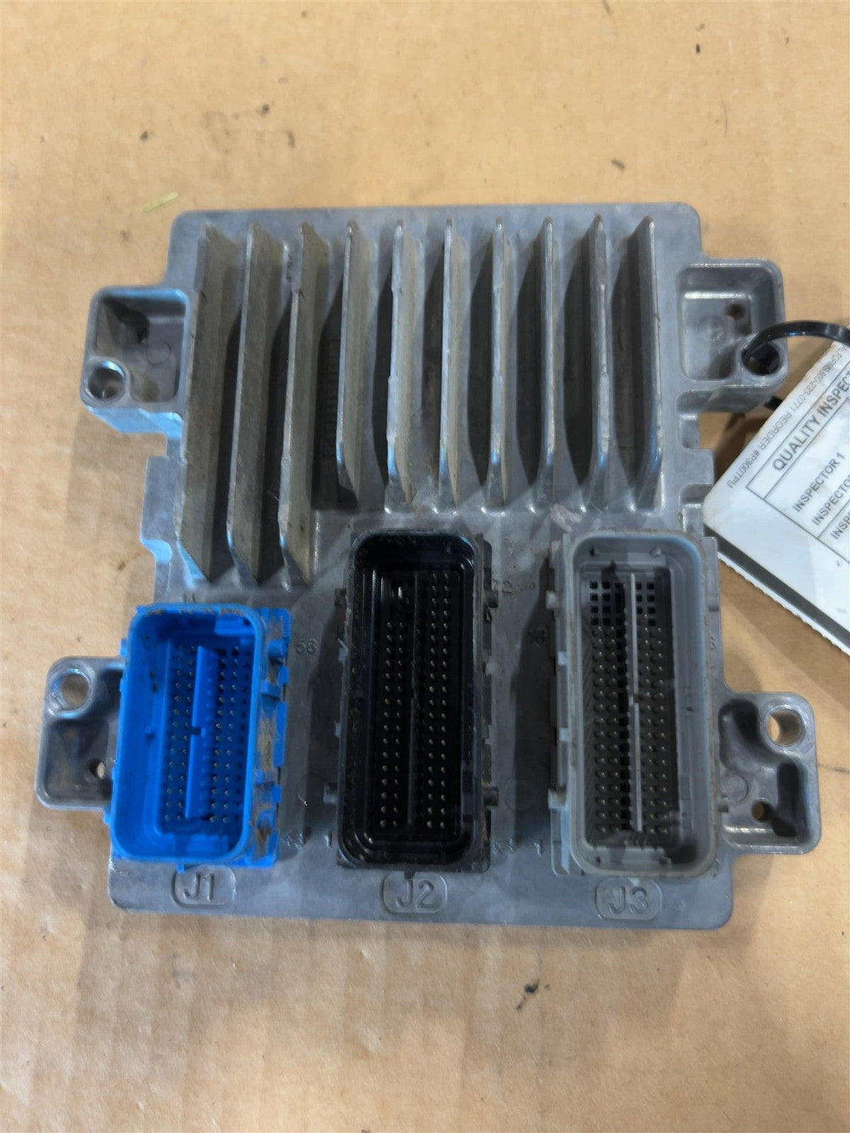 Engine Control Module (ECM/PCM) from a 2016 Buick Encore, photo 1