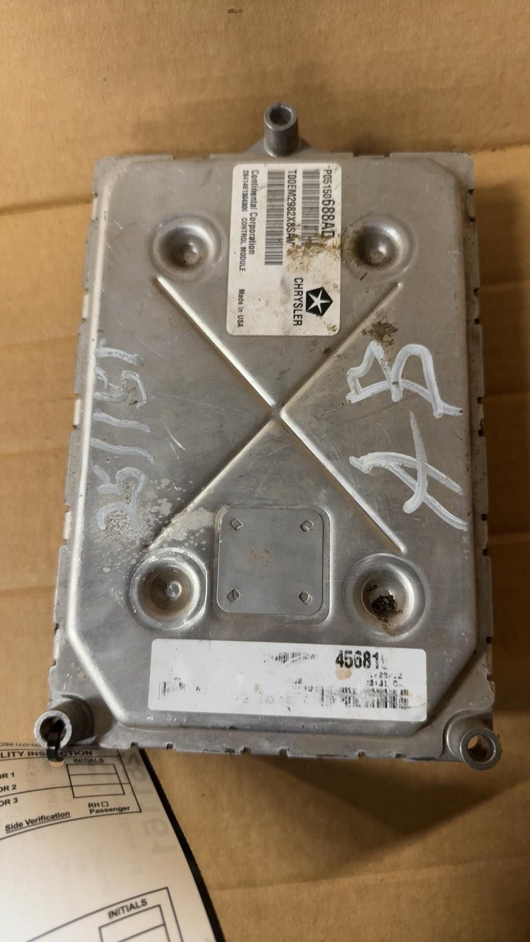Engine Control Module (ECM/PCM) from a 2013 Dodge Dart, photo 1
