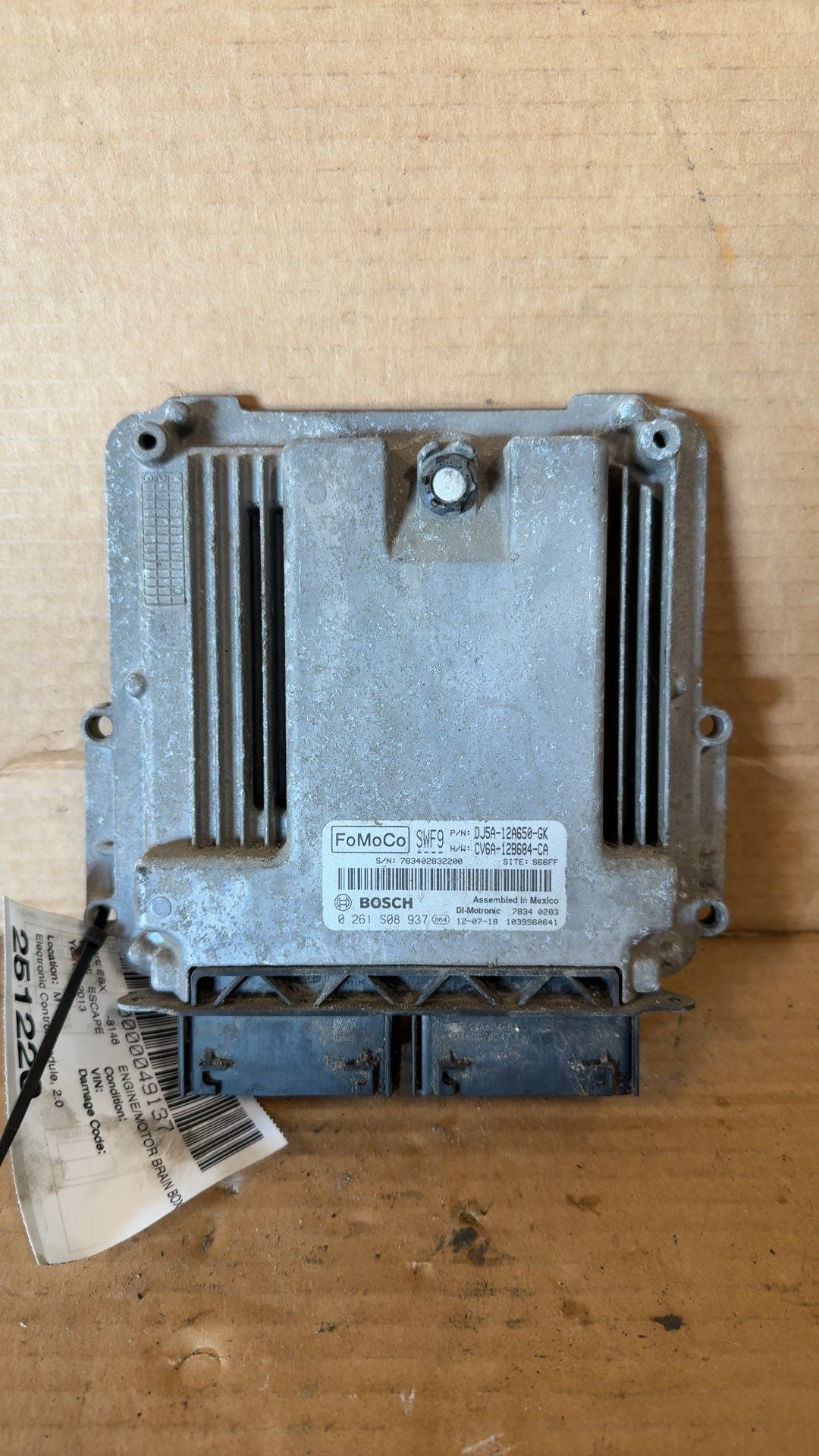 Engine Control Module (ECM/PCM) from a 2013 Ford Escape, photo 1