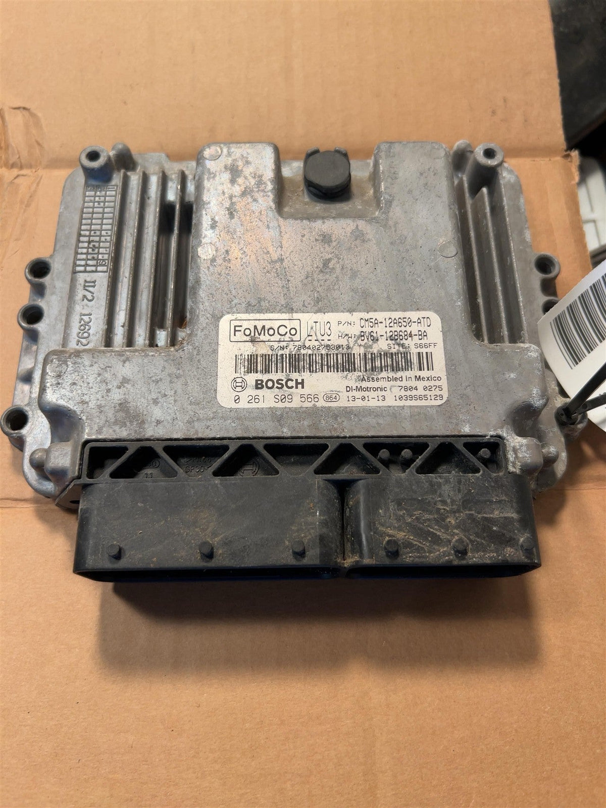 Engine Control Module (ECM/PCM) from a 2013 Ford Focus, photo 1