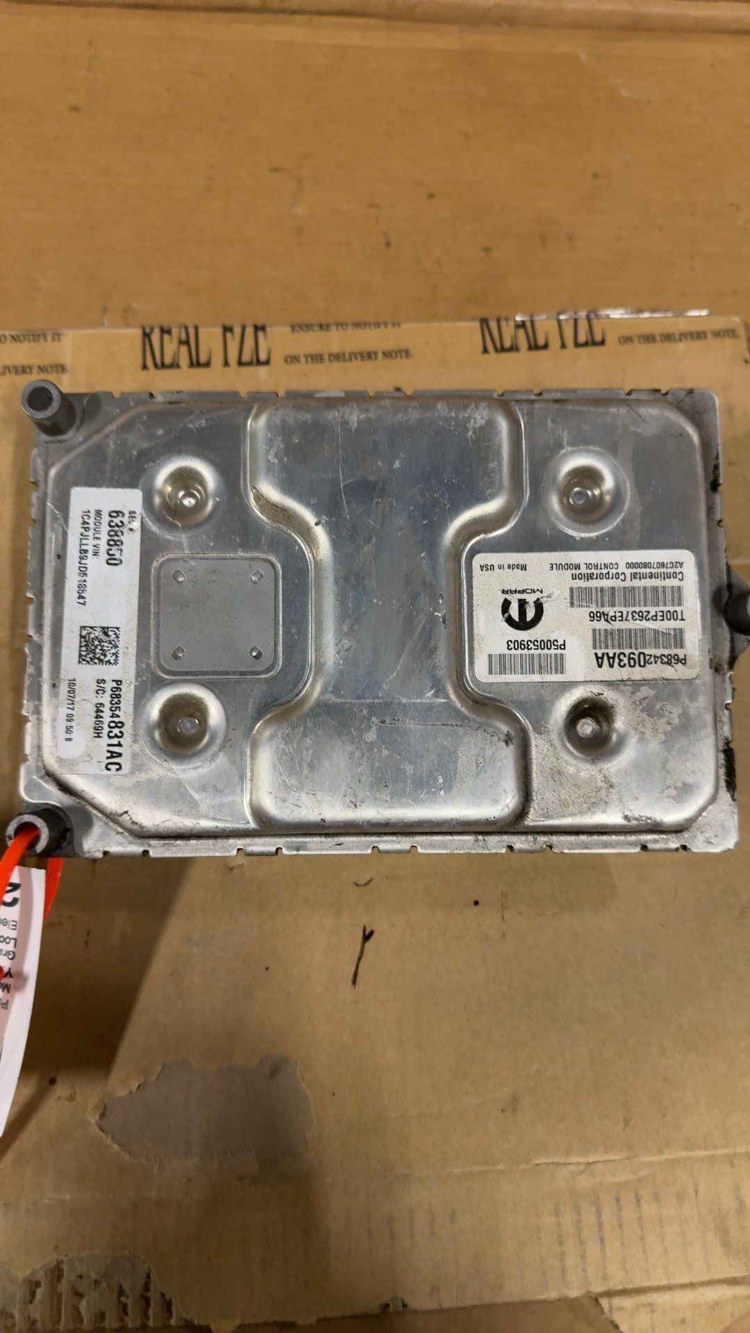 Engine Control Module (ECM/PCM) from a 2018 Jeep Cherokee, photo 1