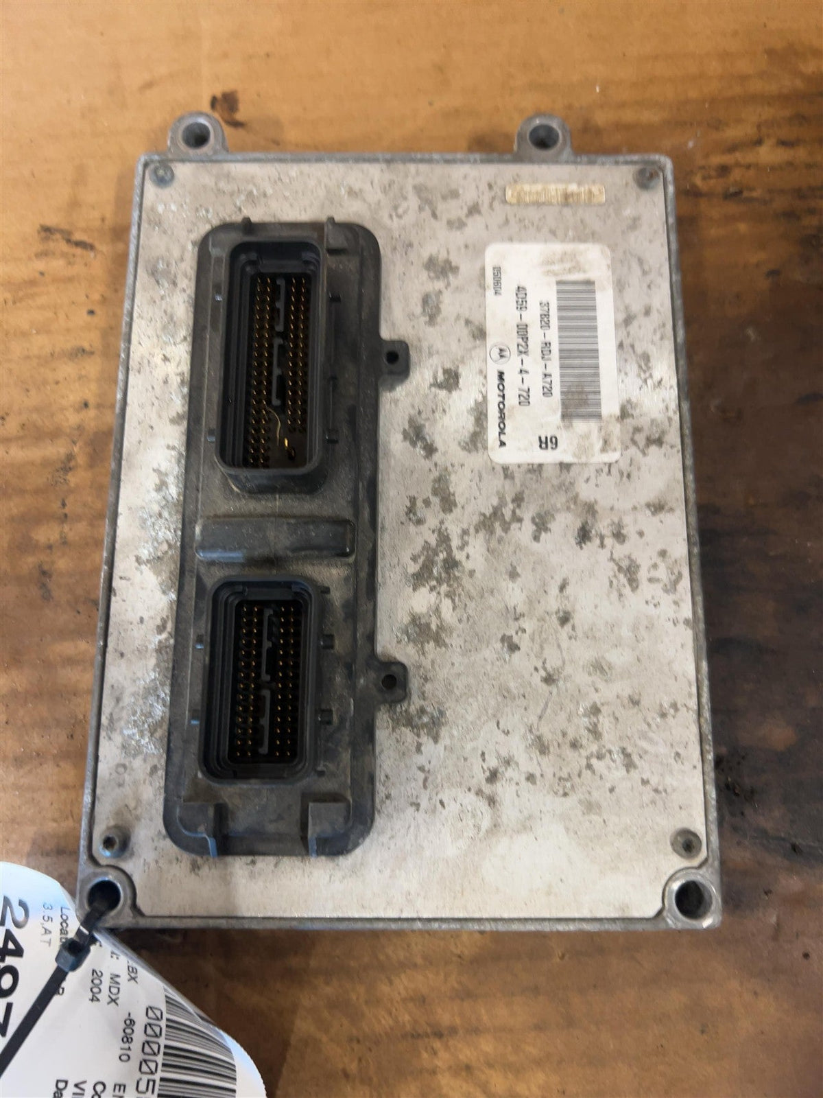 Engine Control Module (ECM/PCM) from a 2004 Acura MDX, photo 1