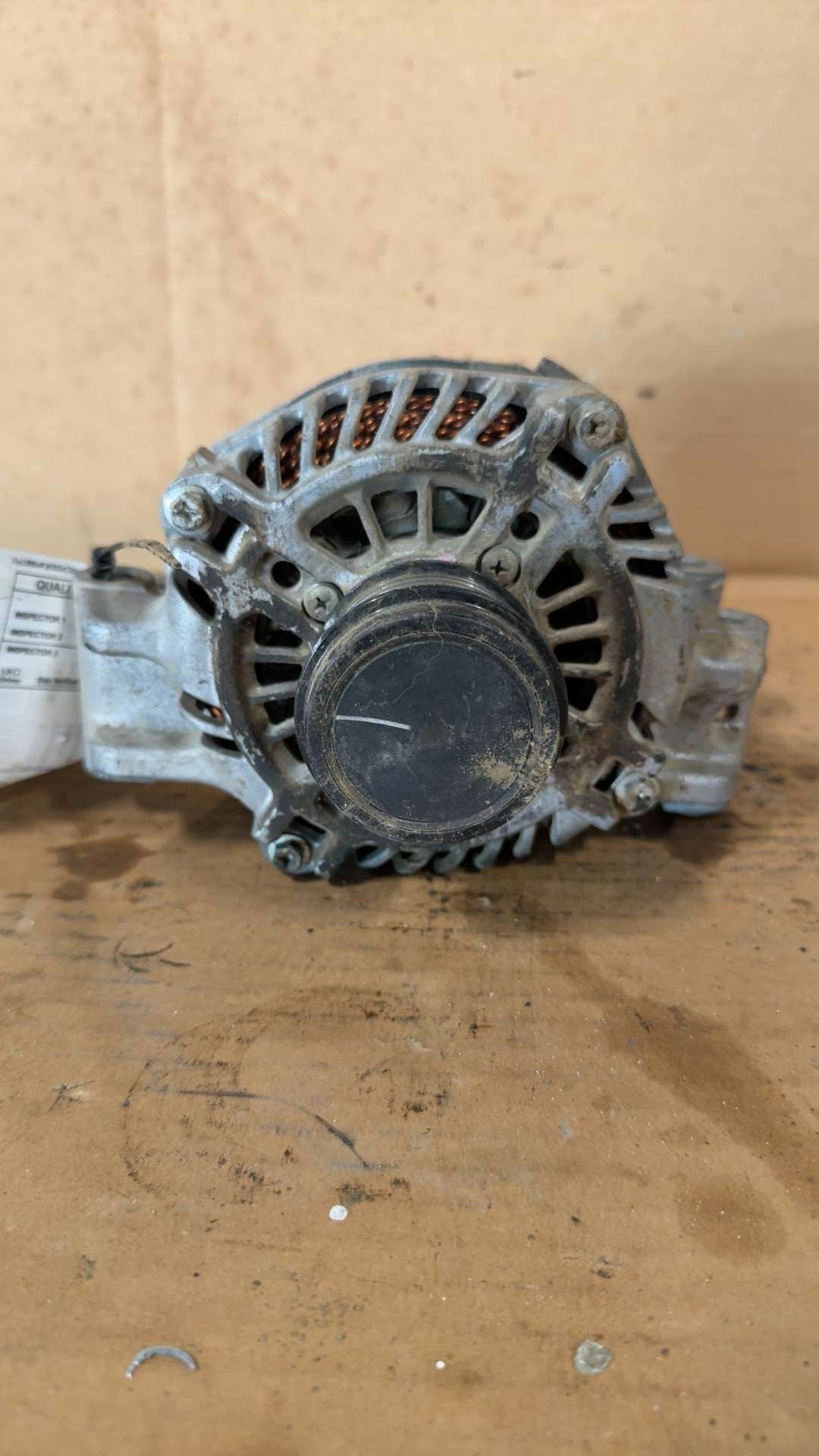 Alternator from a 2014 Dodge Dart, photo 1