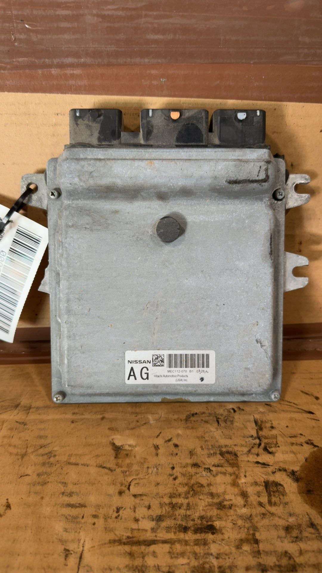Engine Control Module (ECM/PCM) from a 2011 Nissan Altima, photo 1