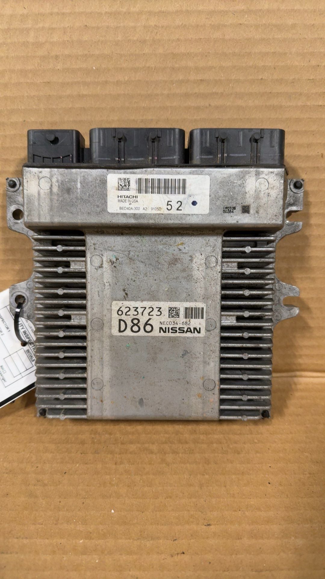 Engine Control Module (ECM/PCM) from a 2019 Nissan Pathfinder, photo 1