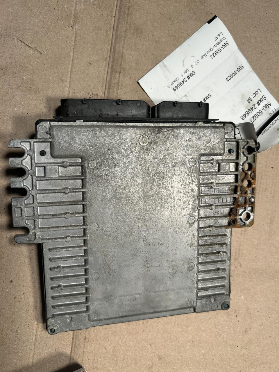Engine Control Module (ECM/PCM) from a 2006 Nissan, photo 1