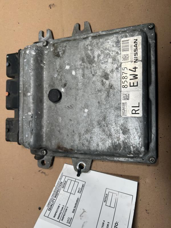 Engine Control Module (ECM/PCM) from a 2013 Nissan Rogue, photo 1