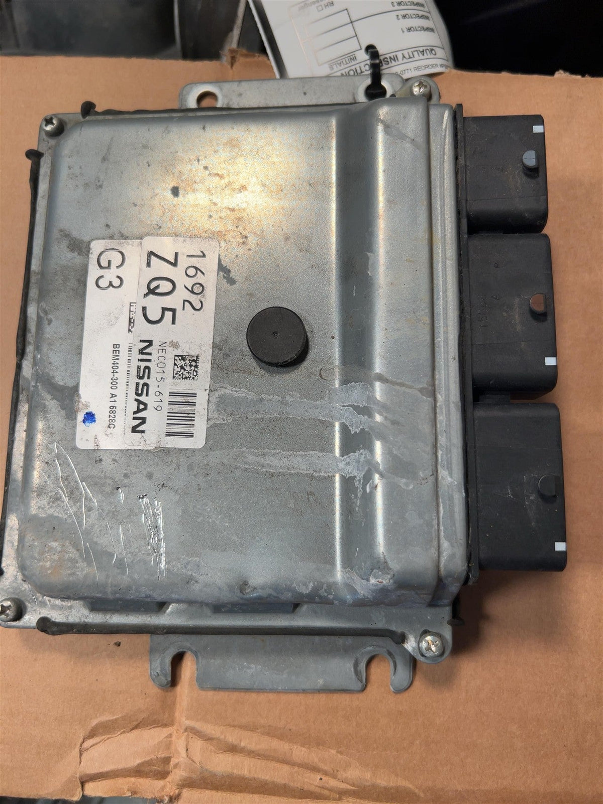 Engine Control Module (ECM/PCM) from a 2015 Nissan Sentra, photo 1