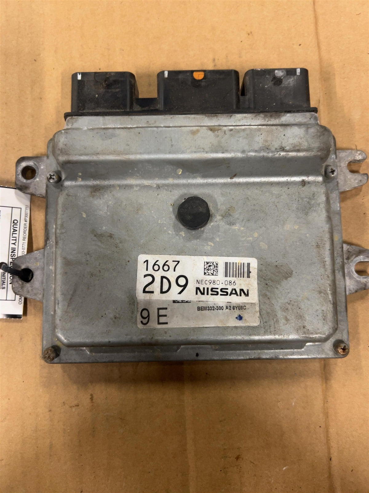 Engine Control Module (ECM/PCM) from a 2017 Nissan Versa, photo 1