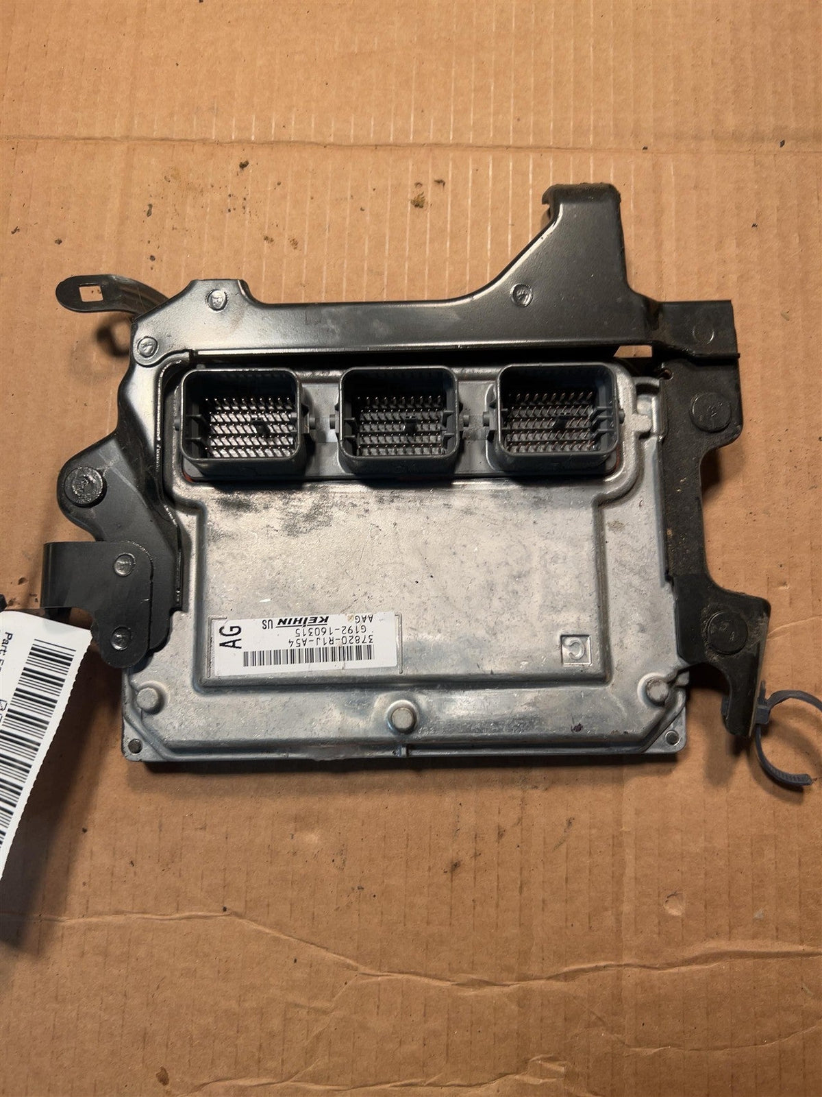 Engine Control Module (ECM/PCM) from a 2014 Honda Civic, photo 1