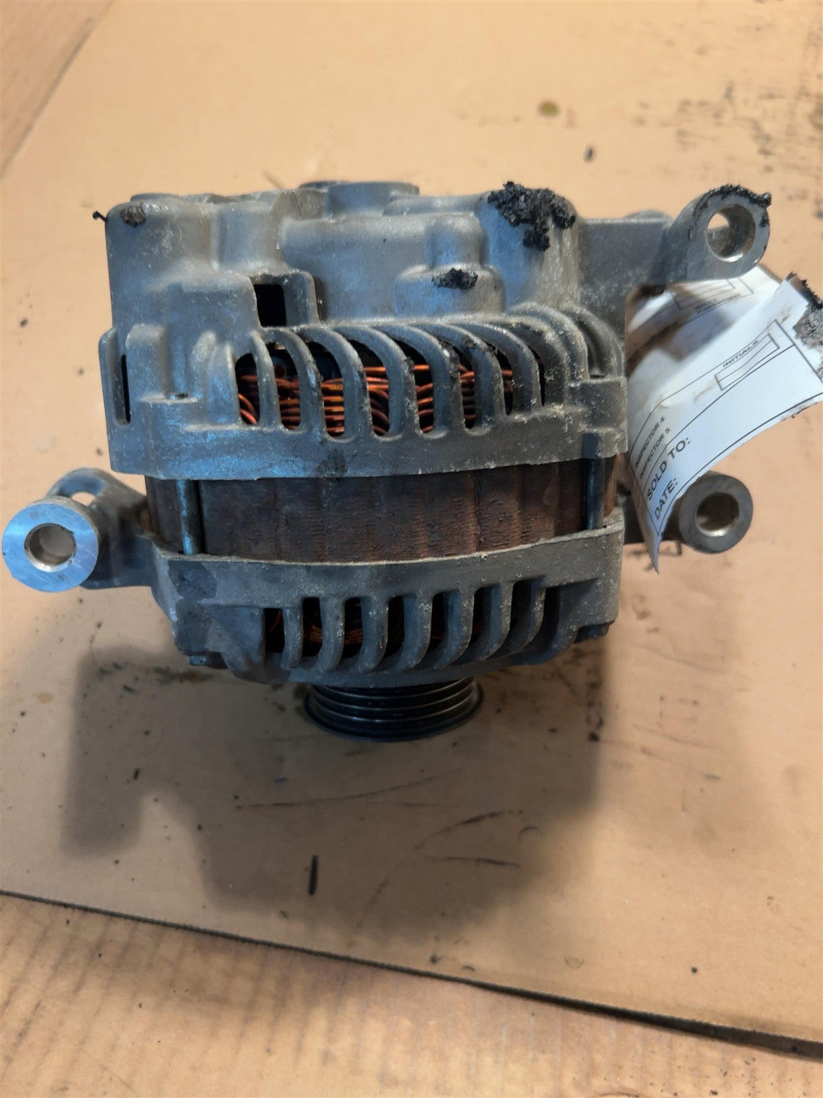 Alternator from a 2010 Ford Explorer, photo 1