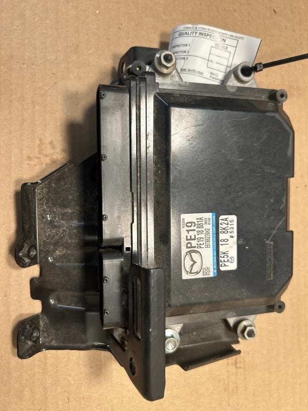 Engine Control Module (ECM/PCM) from a 2014 Mazda 3, photo 1