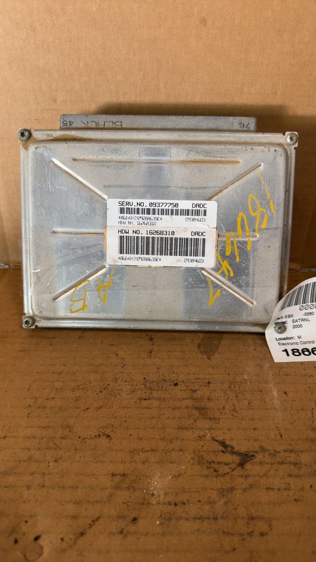 Engine Control Module (ECM/PCM) from a 2000 Saturn L Series, photo 1