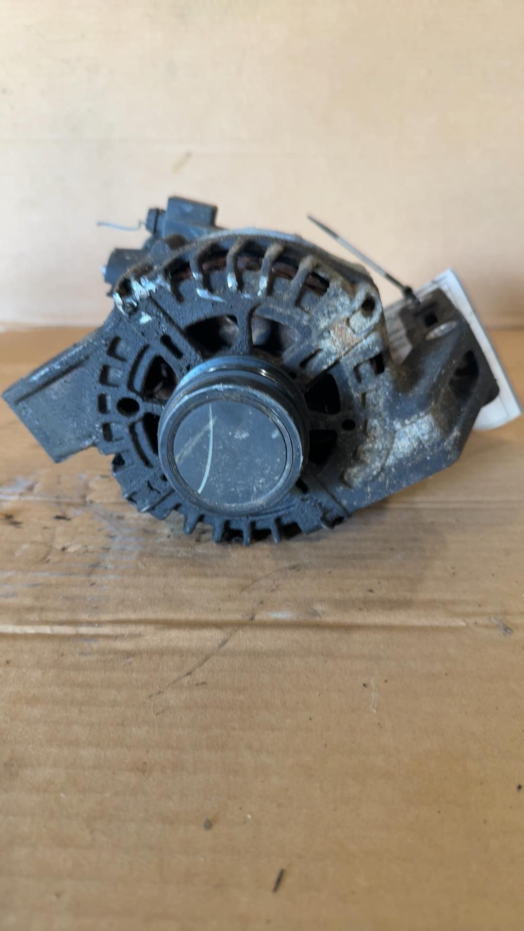 Alternator from a 2015 Ford Focus, photo 1