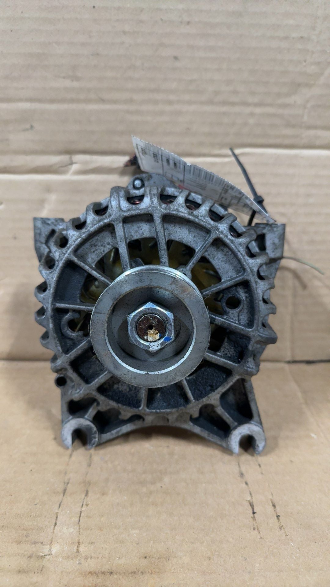 Alternator from a 1998 Lincoln Continental, photo 1