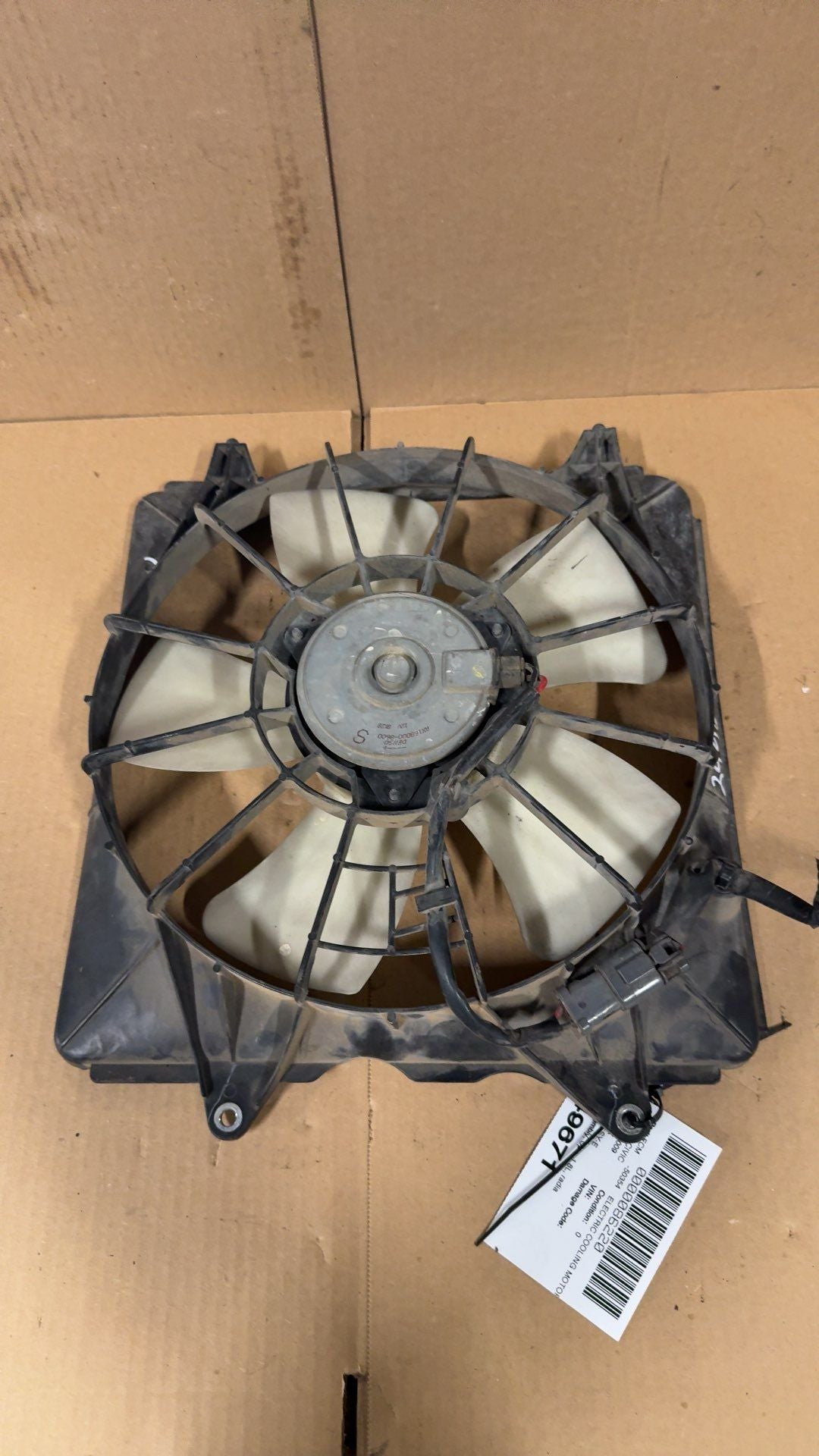 Radiator Fan Assembly from a 2009 Honda Civic, left side, photo 1