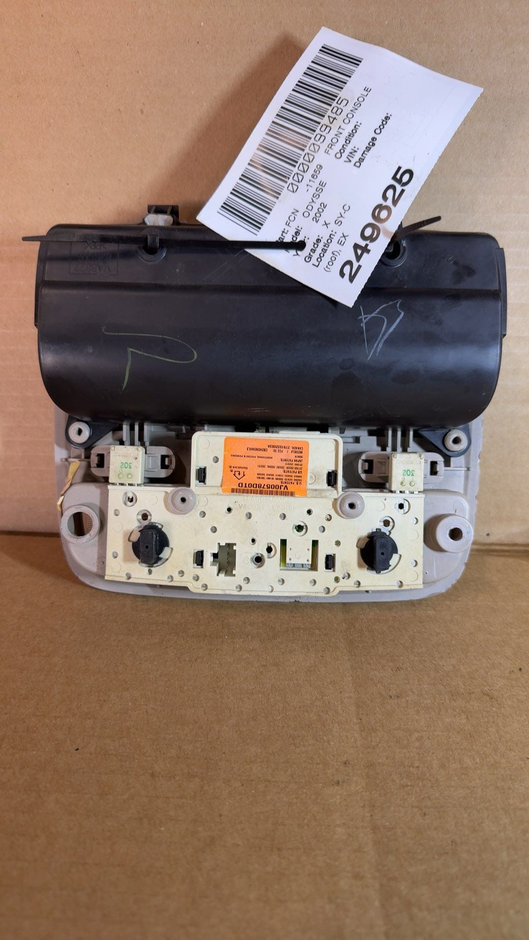 Overhead Console from a 2002 Honda Odyssey, front, photo 2