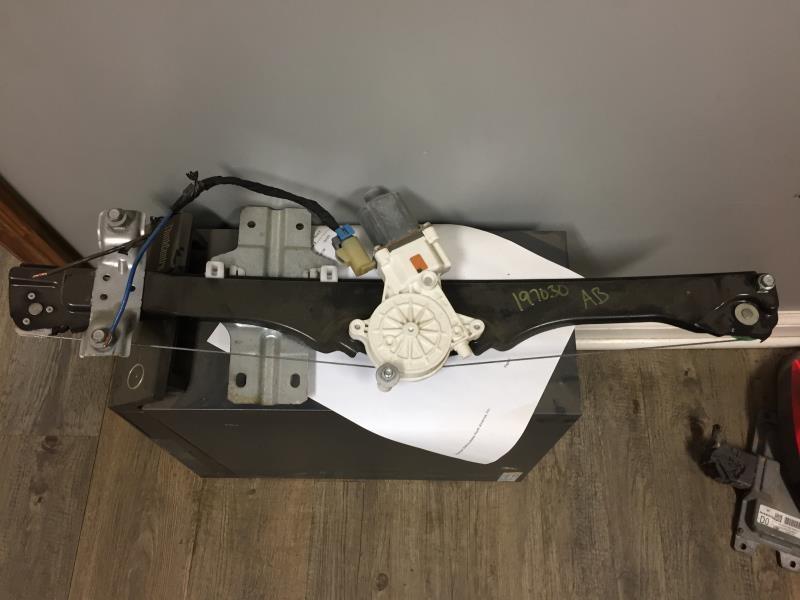 Window Regulator from a 2009 Chevrolet Traverse, front, left side, photo 1
