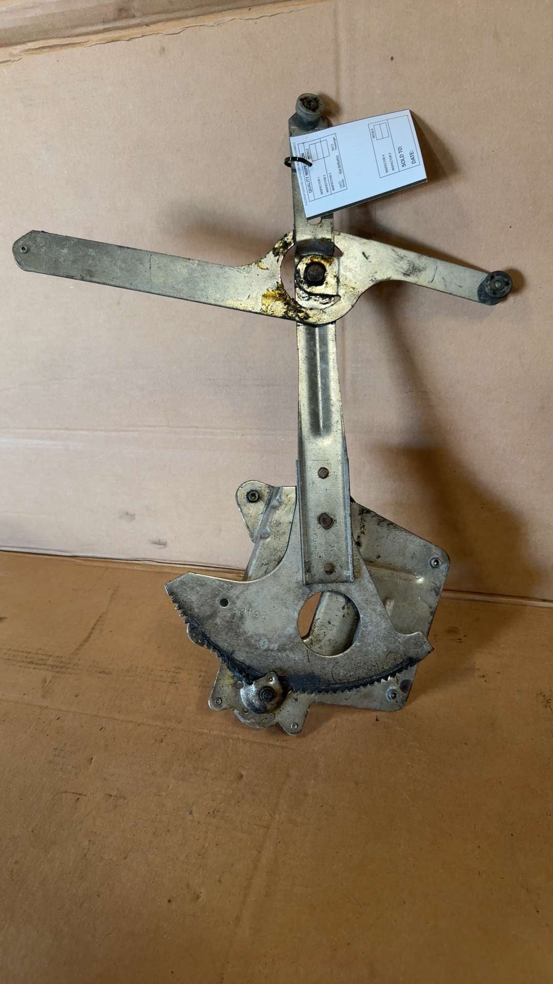 Window Regulator from a 1999 GMC Sonoma, front, left side, photo 3
