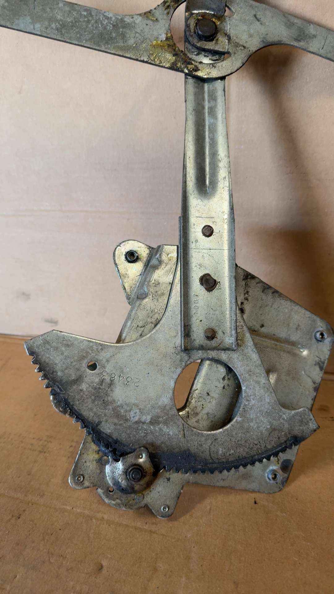 Window Regulator from a 1999 GMC Sonoma, front, left side, photo 4