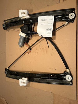 Window Regulator from a 2012 Dodge Caravan, front, right side, photo 1