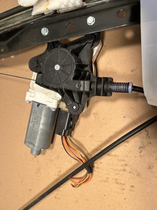 Window Regulator from a 2012 Dodge Caravan, front, right side, photo 2