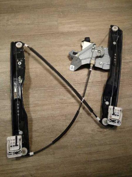 Window Regulator from a 2011 Ford Taurus, front, left side, photo 1