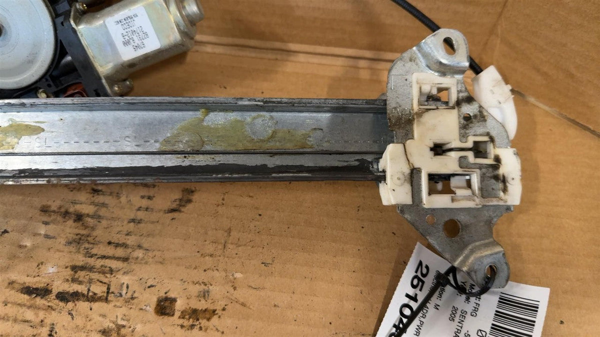 Window Regulator from a 2005 Nissan Sentra, front, left side, photo 5