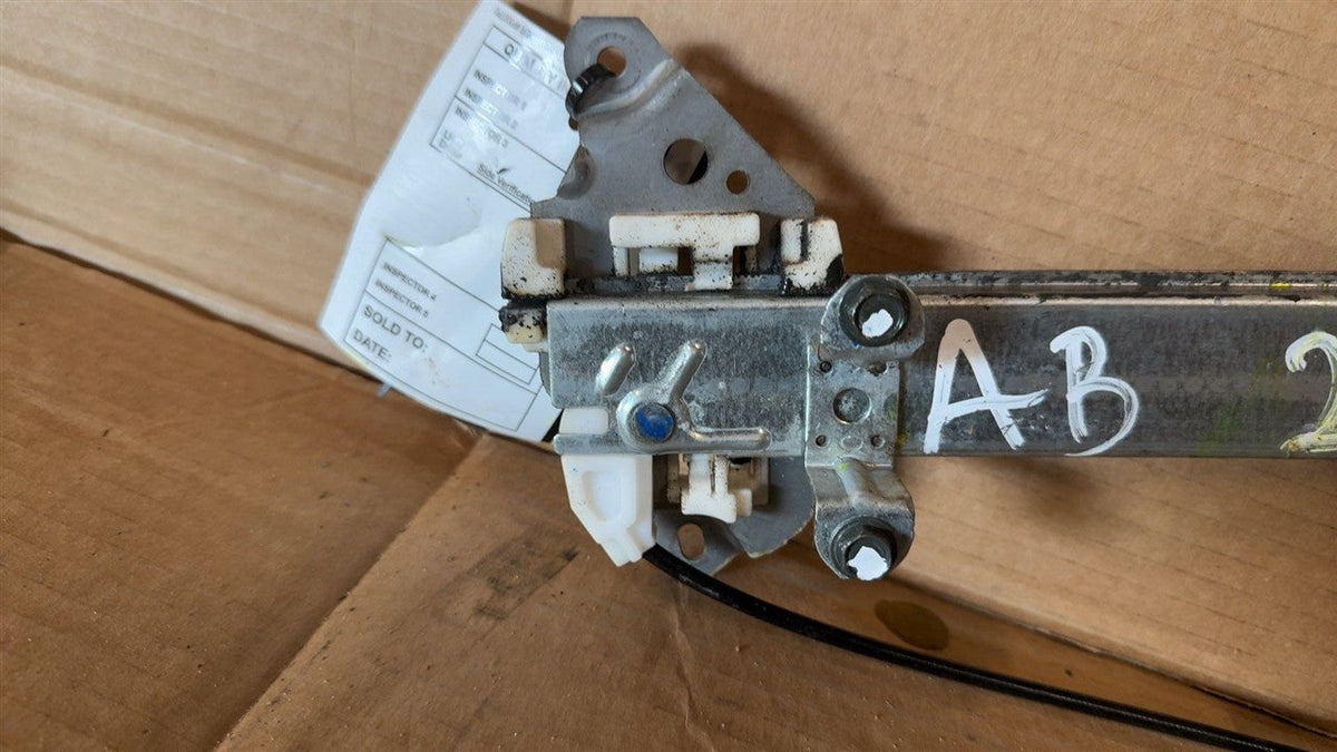 Window Regulator from a 2005 Nissan Sentra, front, right side, photo 3