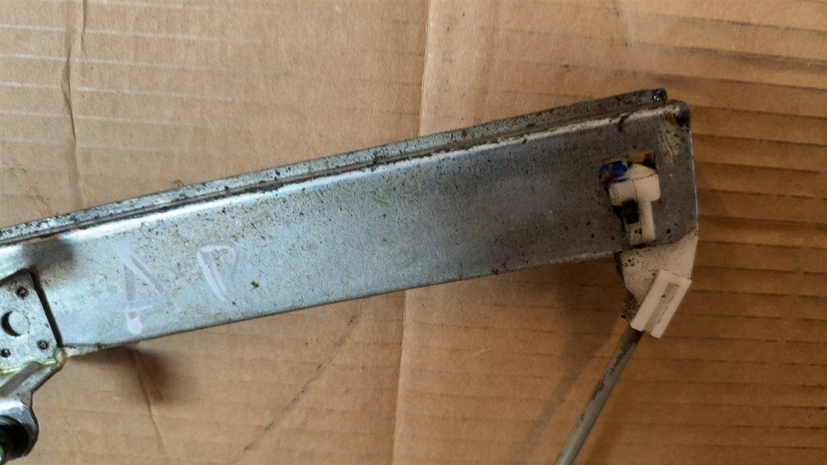 Window Regulator from a 2005 Nissan Sentra, front, right side, photo 4