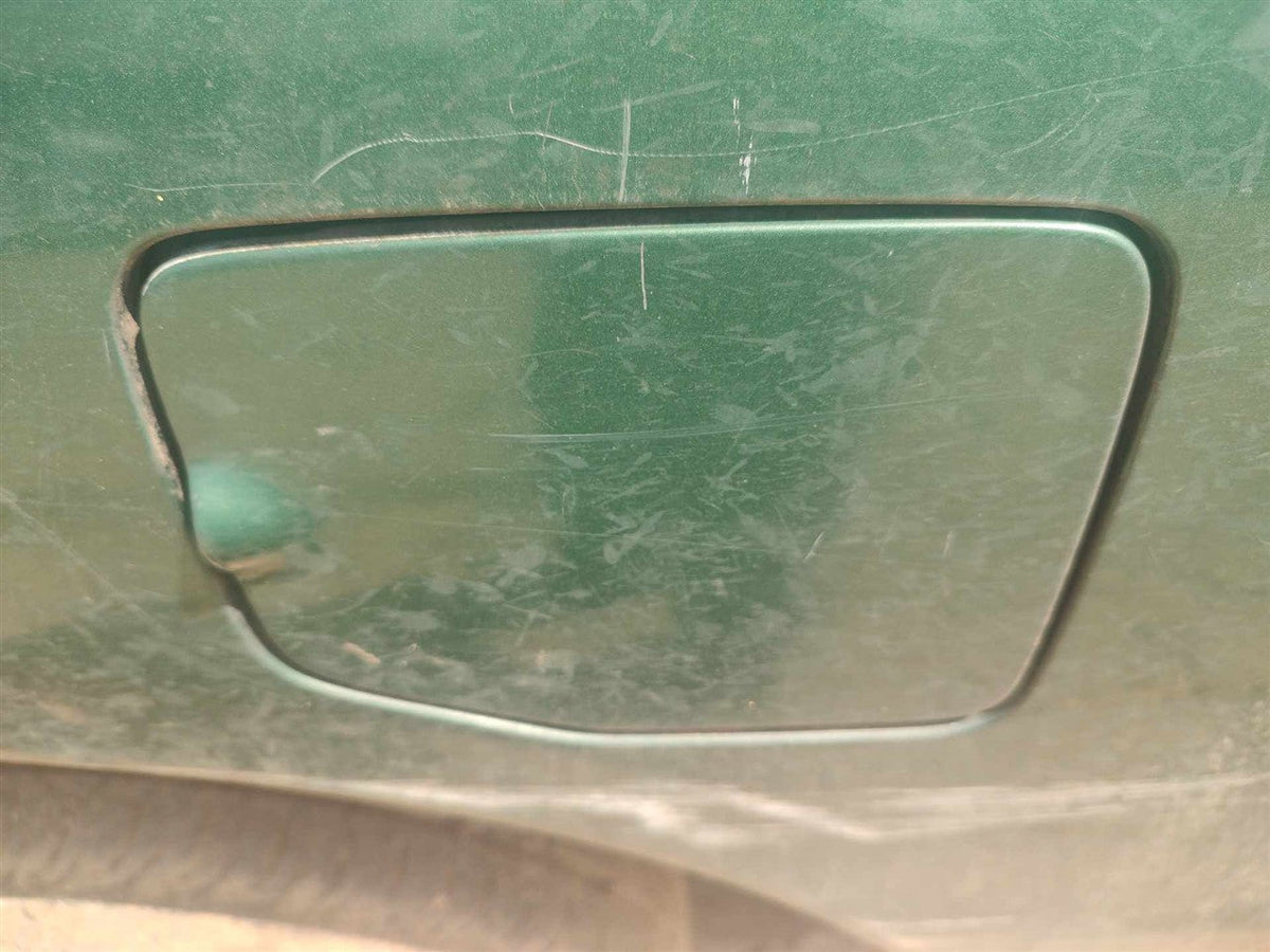 Fuel Door from a 1999 Nissan Frontier, photo 1