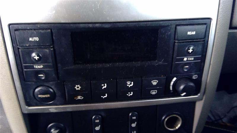 Climate Control Panel from a 2006 Dodge, front, photo 1