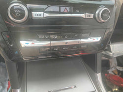 Climate Control Panel from a 2021 Ford Explorer, front, photo 1