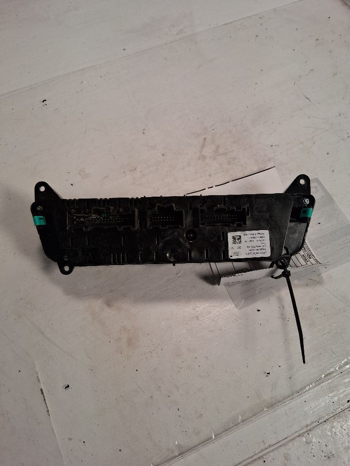 Climate Control Panel from a 2021 Ford Explorer, front, photo 3