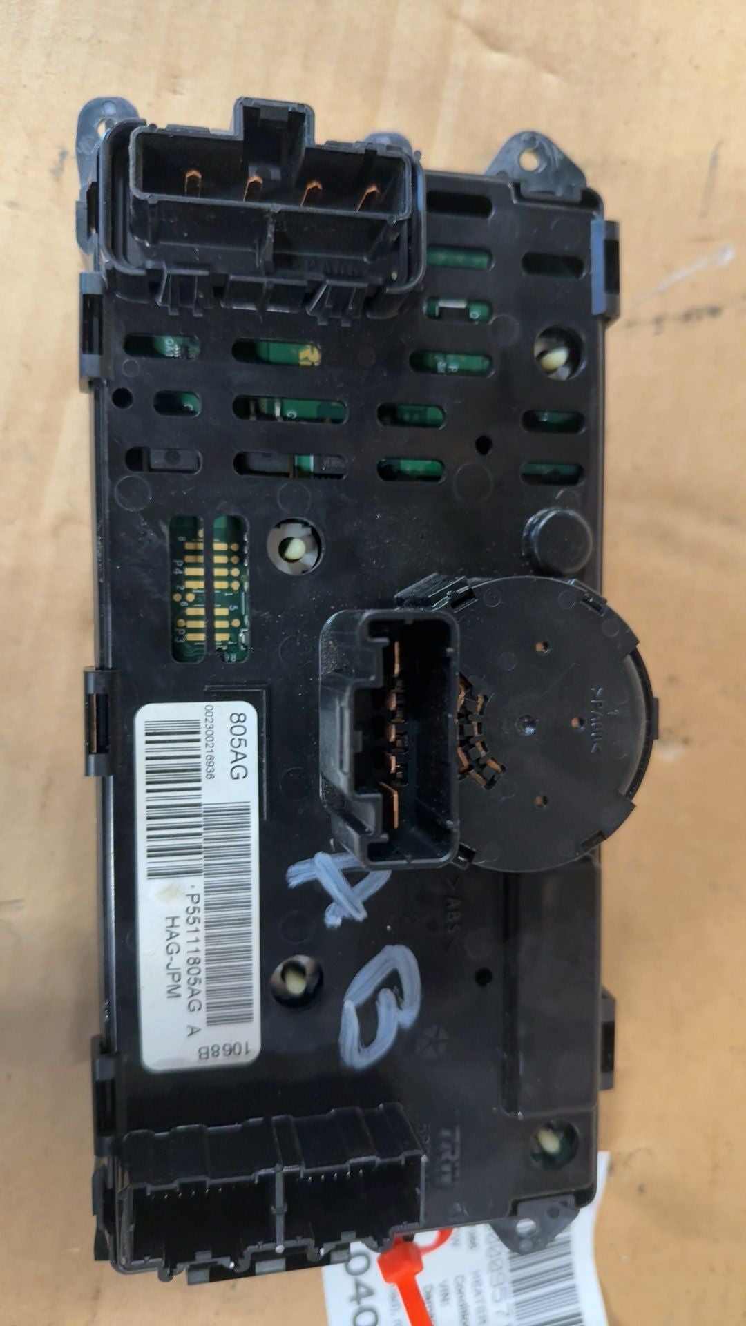 Climate Control Panel from a 2008 Chrysler Town & Country, front, photo 2