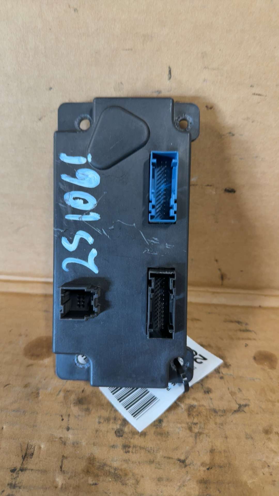 Climate Control Panel from a 2009 Nissan Armada, front, photo 2