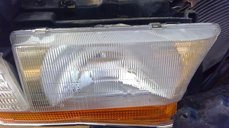 Headlight Assembly from a 1992 Buick Roadmaster, right side, photo 1