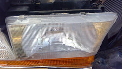 Headlight Assembly from a 1992 Buick Roadmaster, right side, photo 1