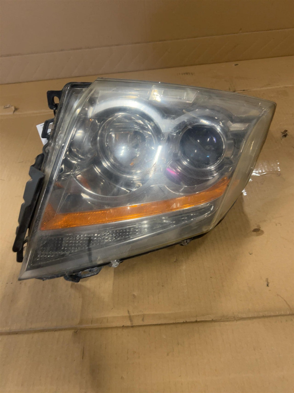 Headlight Assembly from a 2009 Cadillac CTS, right side, photo 1