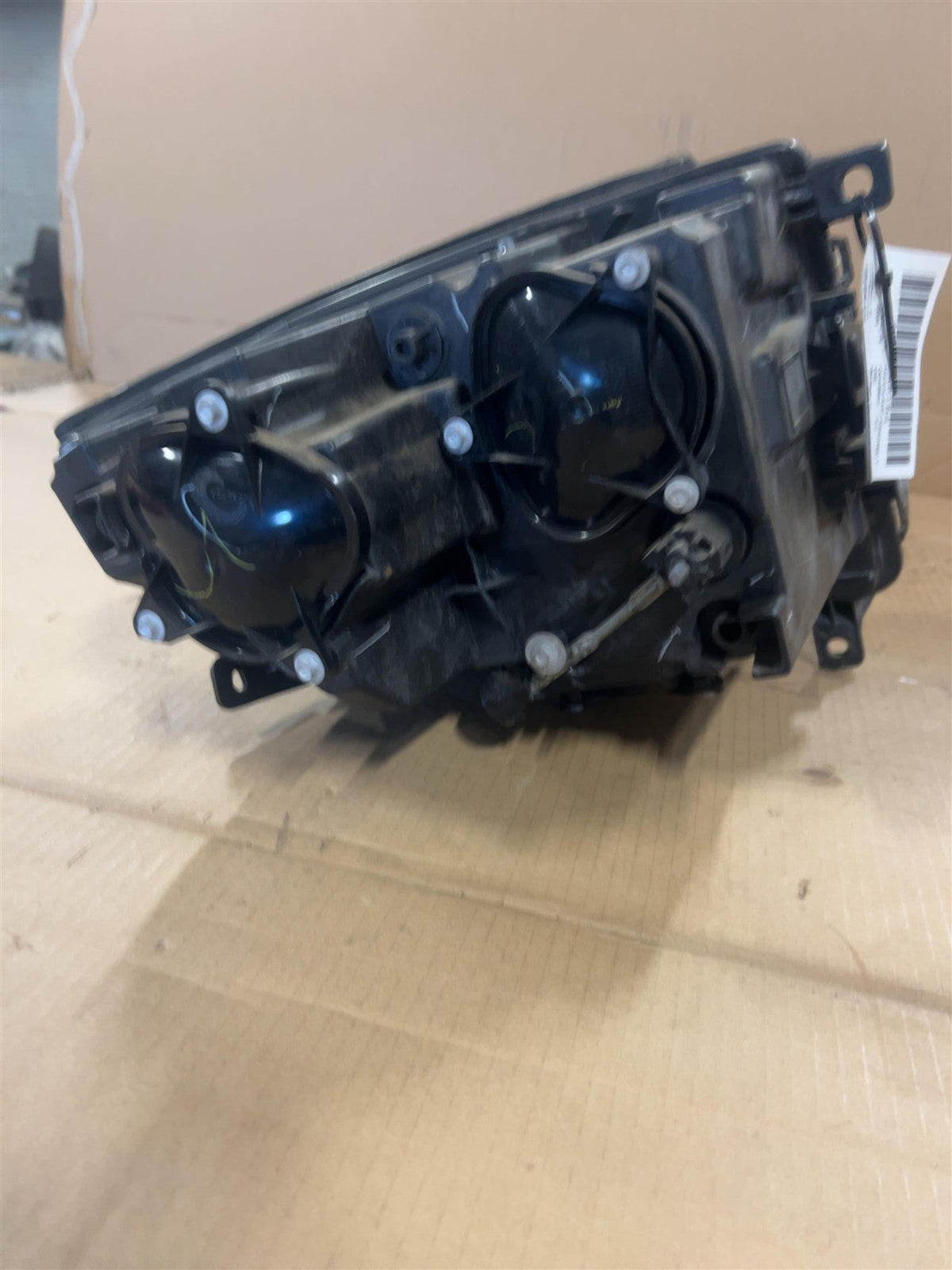 Headlight Assembly from a 2009 Cadillac CTS, right side, photo 2