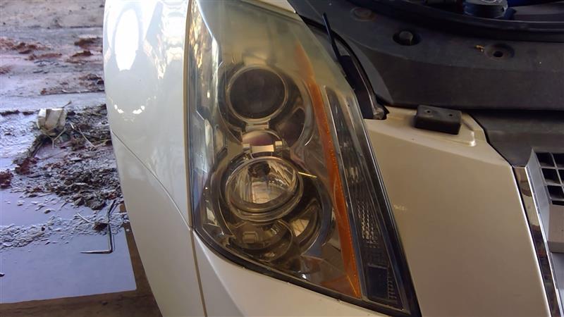 Headlight Assembly from a 2011 Cadillac CTS, right side, photo 1