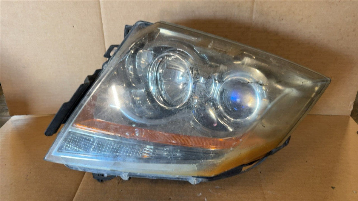 Headlight Assembly from a 2011 Cadillac CTS, right side, photo 2