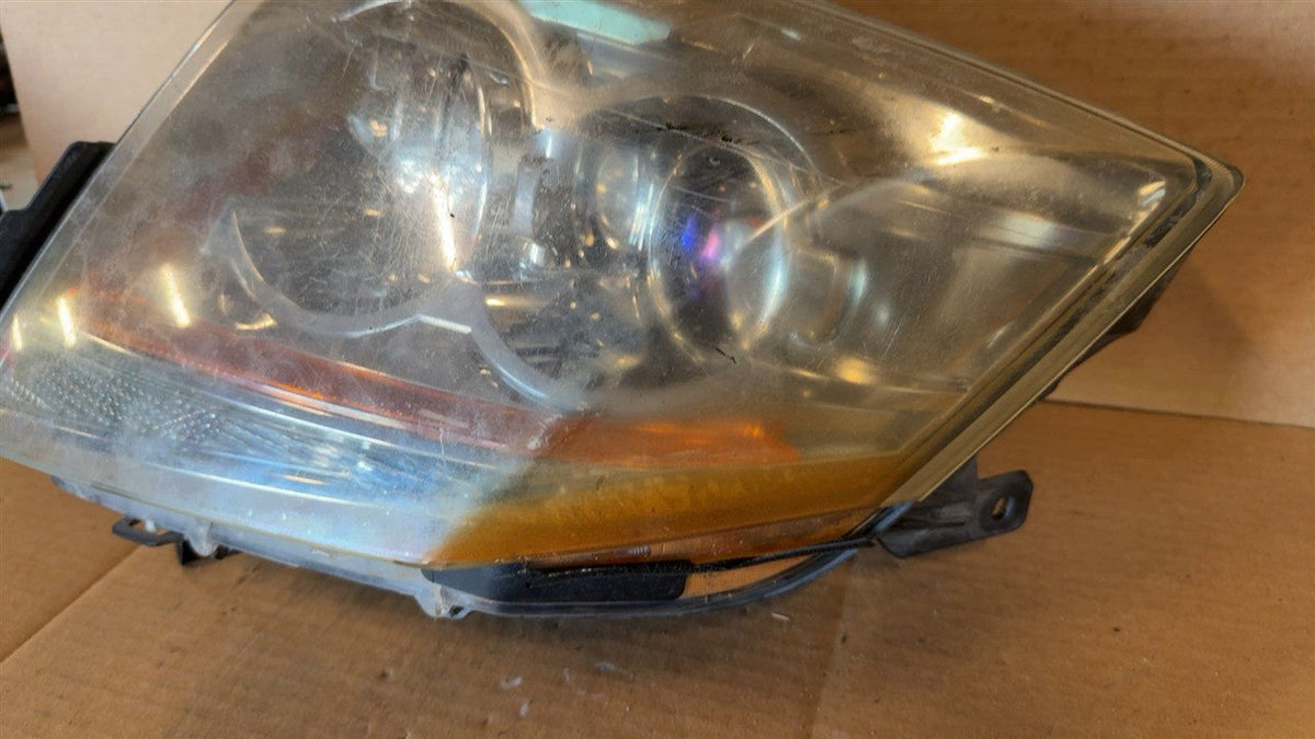 Headlight Assembly from a 2011 Cadillac CTS, right side, photo 3
